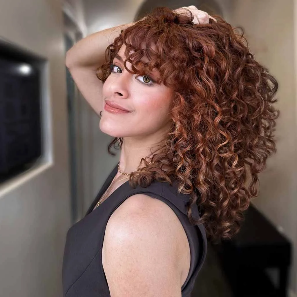 shoulder curly chestnut curly style with curly fringe fringe shown as a curly hairstyles ideas idea, featuring chestnut color