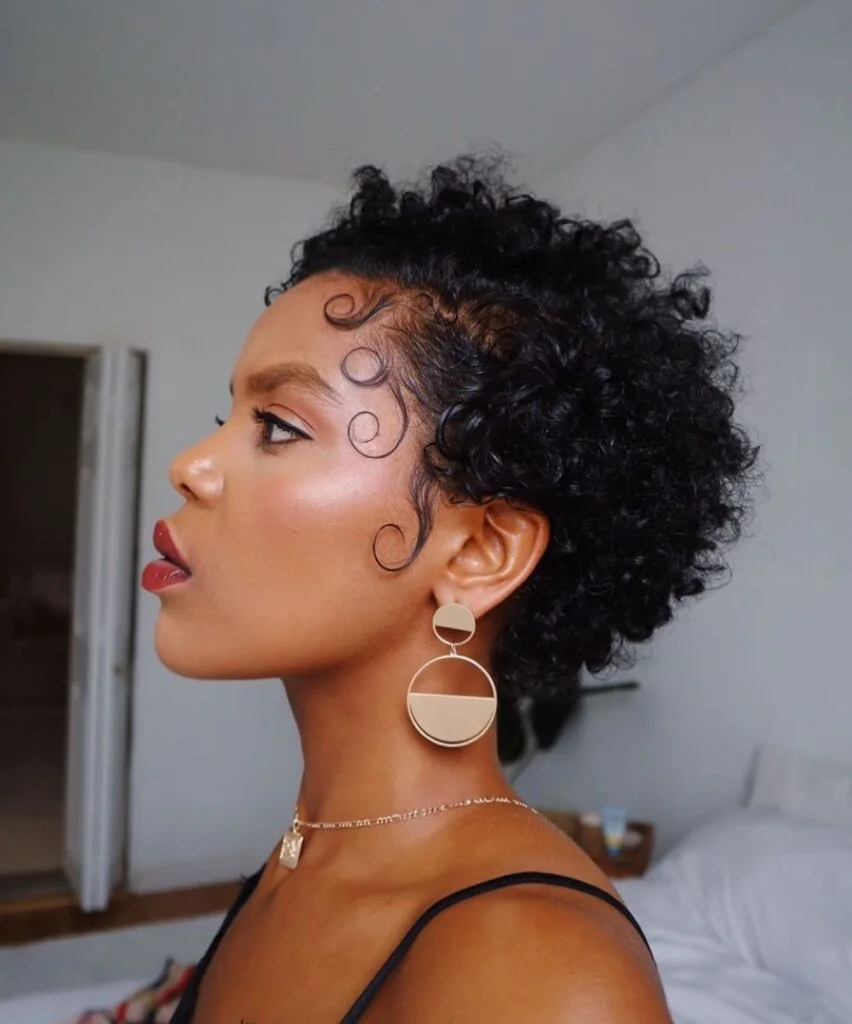 ear coily black curly style shown as a curly hairstyles ideas idea, featuring natural finish
