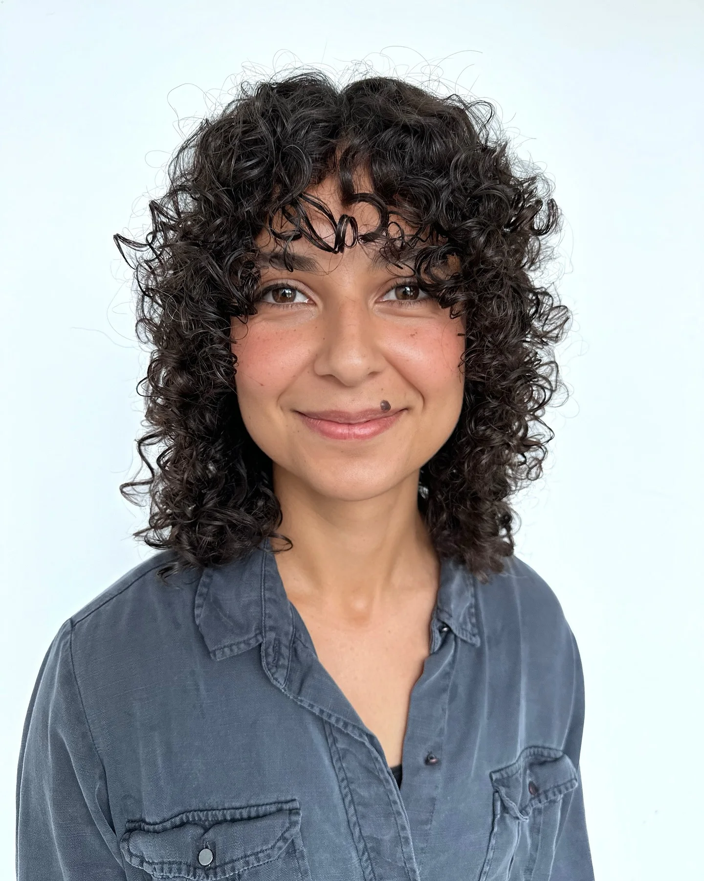 shoulder curly brunette shag with curly fringe fringe shown as a curly hairstyles ideas idea, featuring shoulder outline