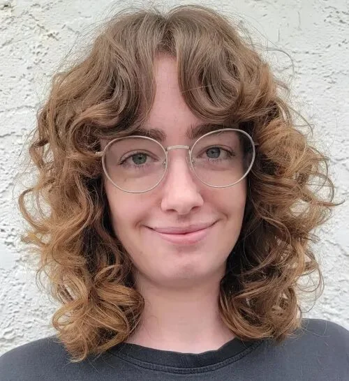 shoulder curly brunette shag with curly fringe fringe shown as a curly hairstyles ideas idea, featuring curly texture, shown in blonde curls with soft face frame