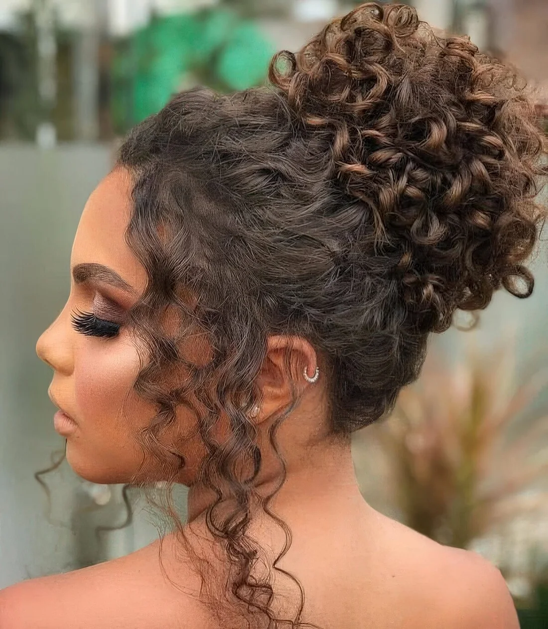 Curly Top Knot with Some Curls Framing the Face - Alternate View.