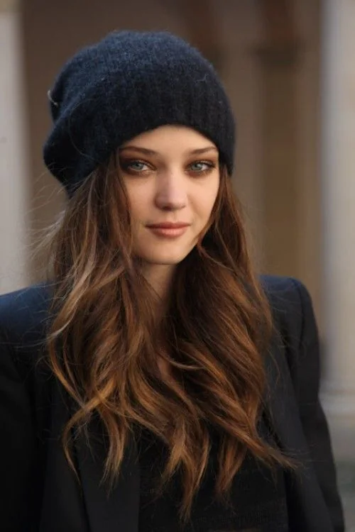 Photo showing loosy waves and a black beanie, with the hairstyle clearly visible.
