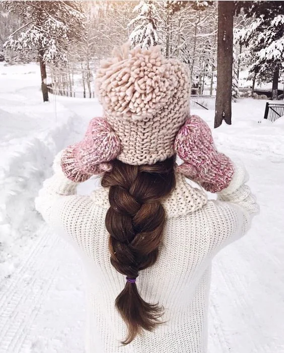 Oversized milk braid and a blush beanie for a girlish look.