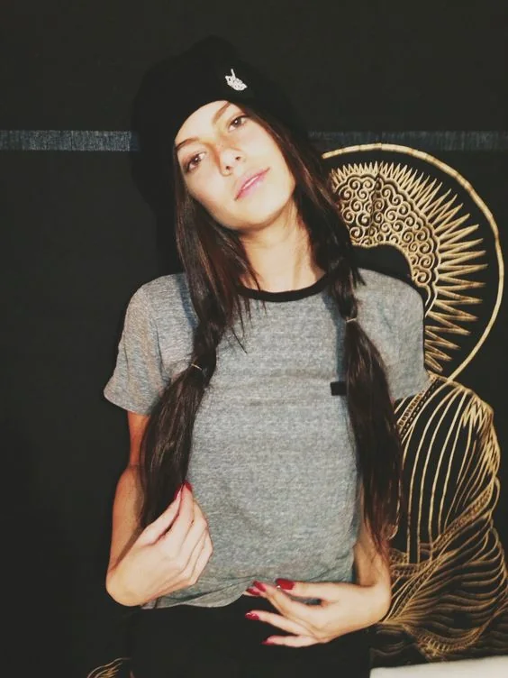 Loose and messy braids with bangs for a casual look.