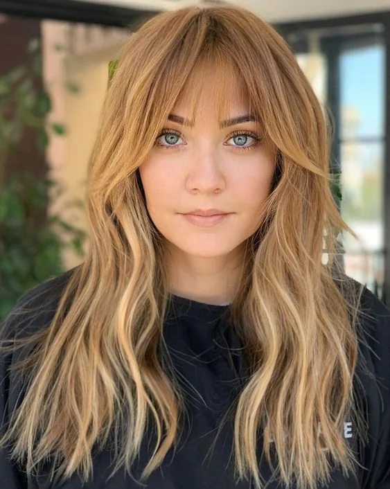 Photo showing blonde balayage, with the hairstyle clearly visible.