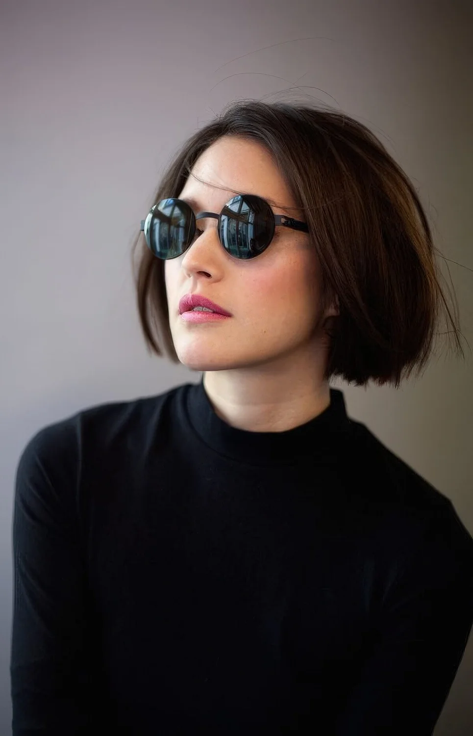 Short brown blunt bob with a lot of volume and a bit of texture.