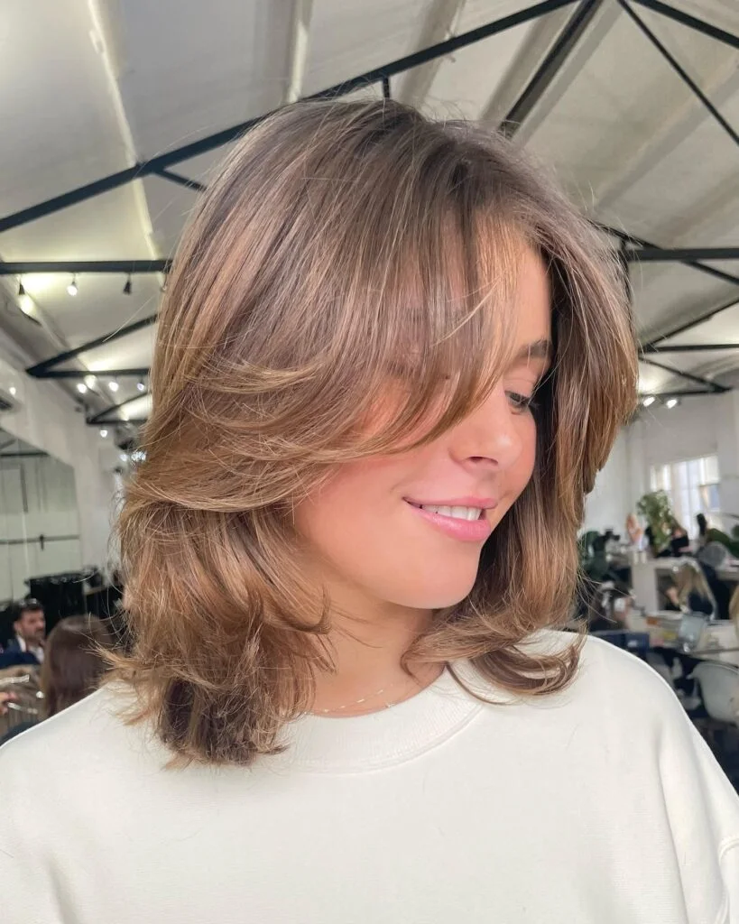 shoulder wavy mocha layers with curtain fringe shown as a dark brown color ideas idea