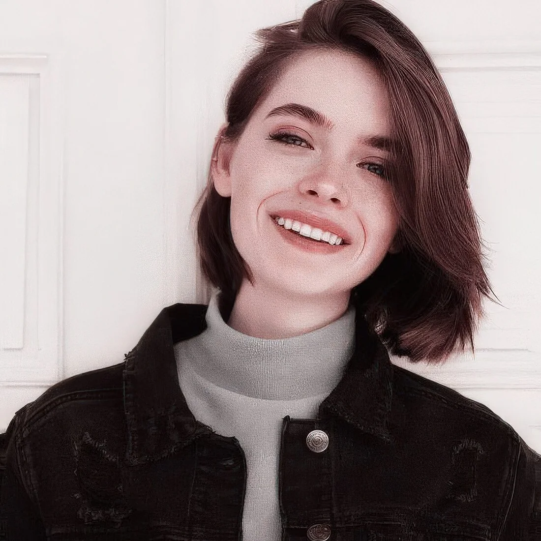 Chestnut short bob with slight waves.