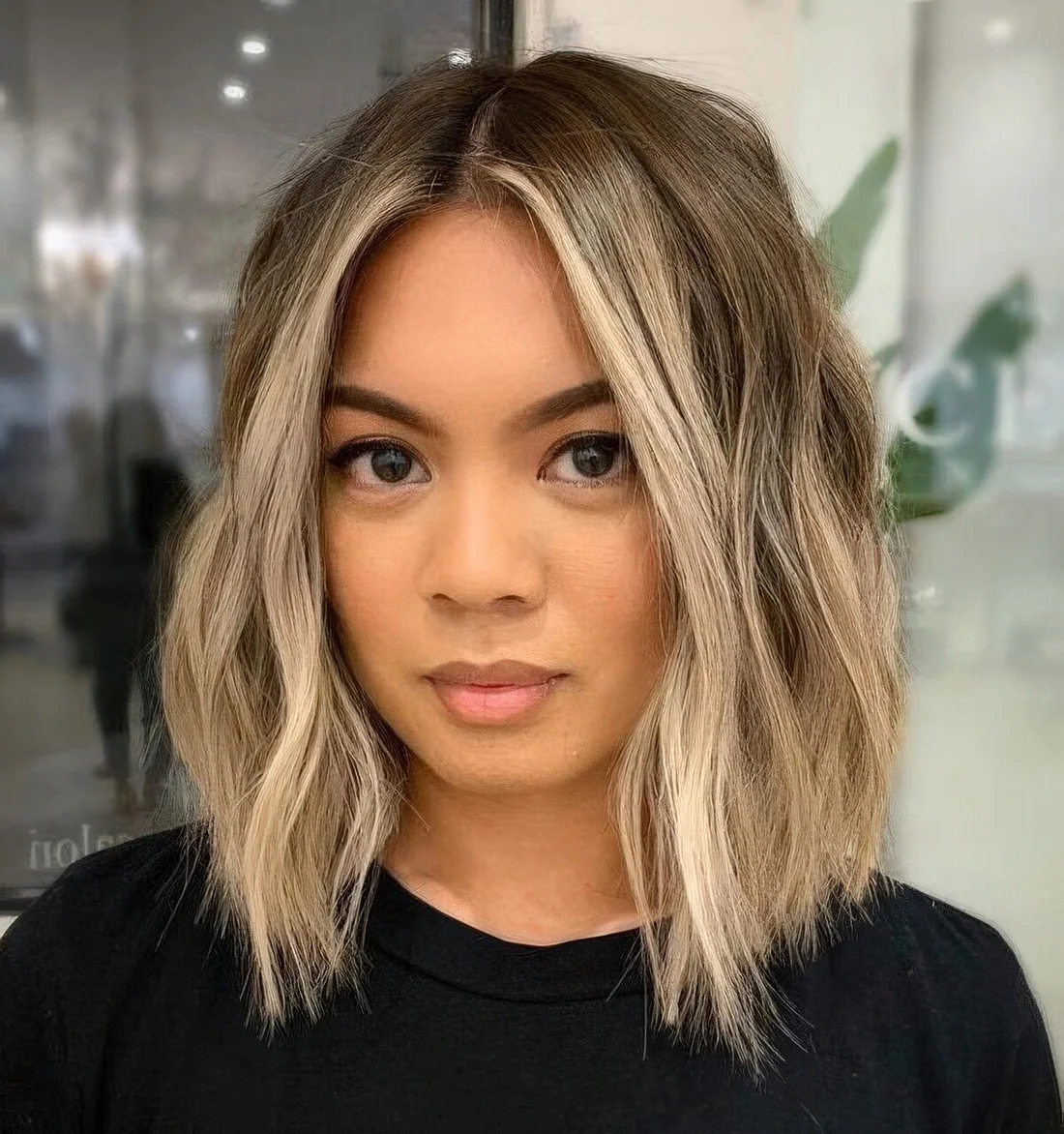 Photo showing hairstyle with a money piece, with the hairstyle clearly visible.