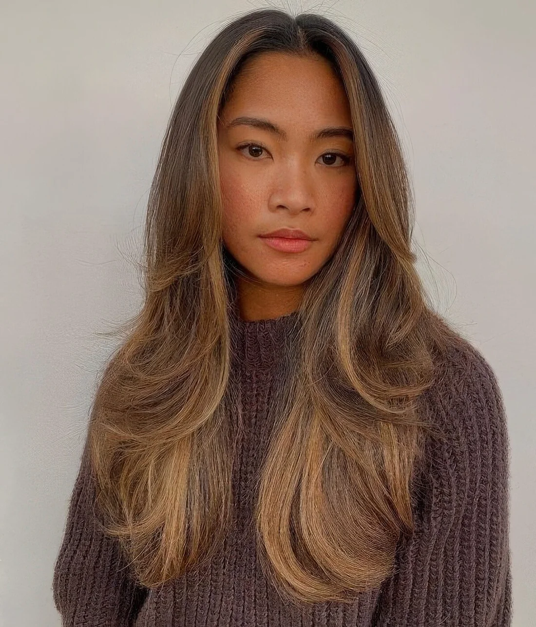 Long hairstyle with a caramel balyage.