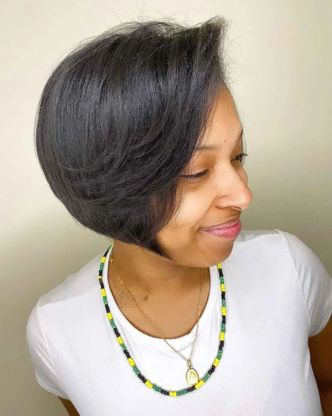 Feathered stacked bob for fine hair.