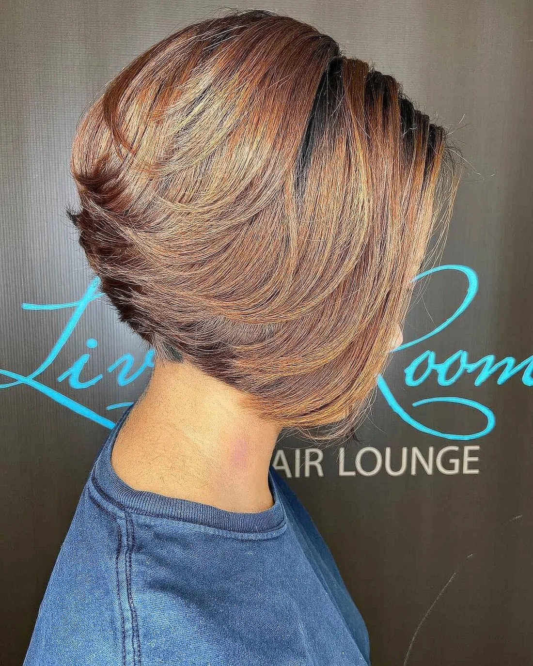 Graduated feathered bob with layers.
