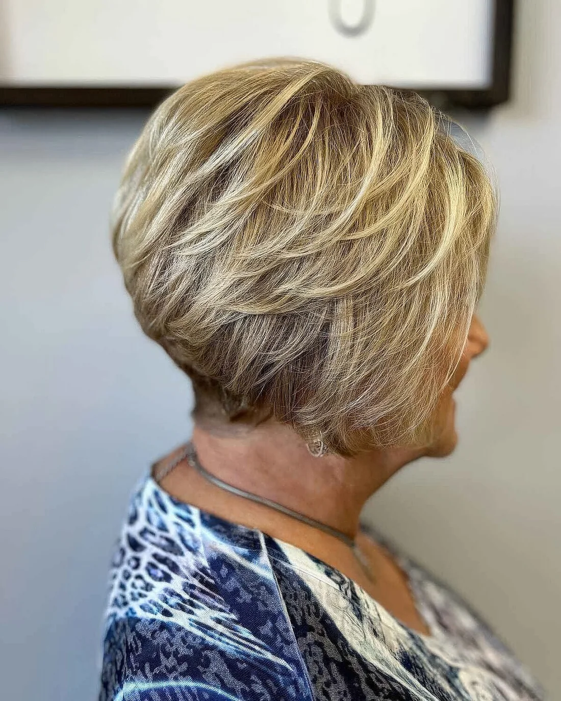 Short stacked bob with feathered layers.