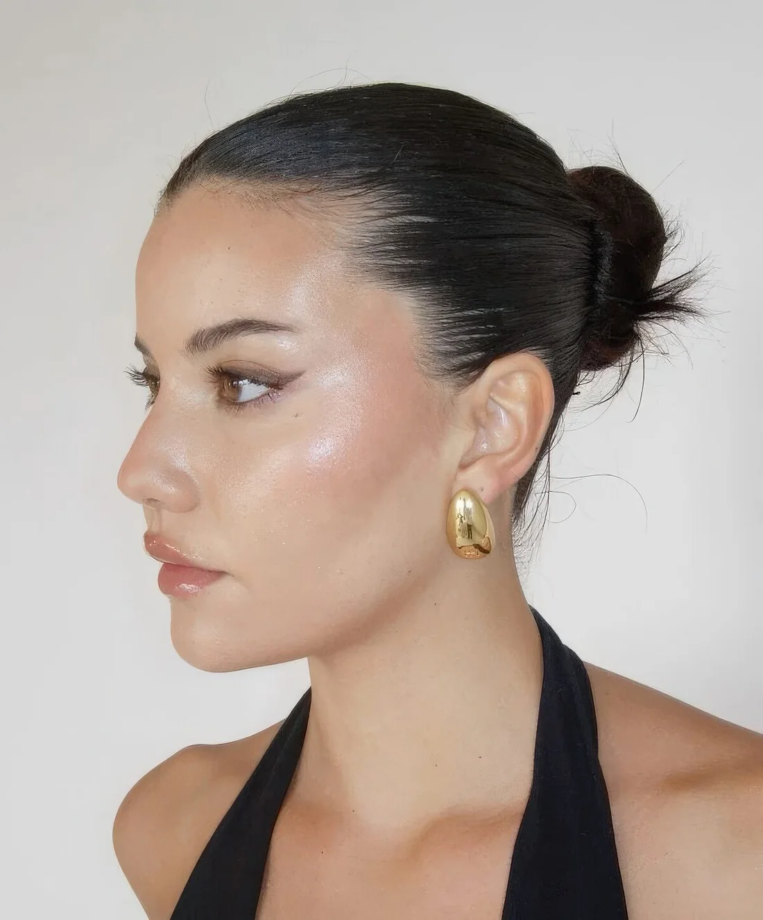 Photo showing mid bun, with the hairstyle clearly visible.