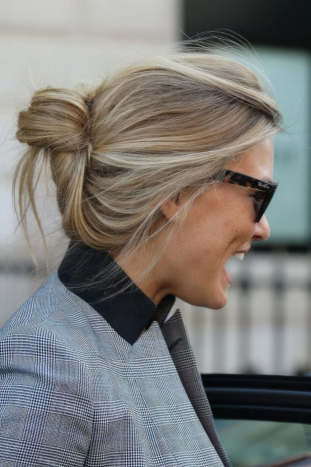 Photo showing messy mid bun, with the hairstyle clearly visible.