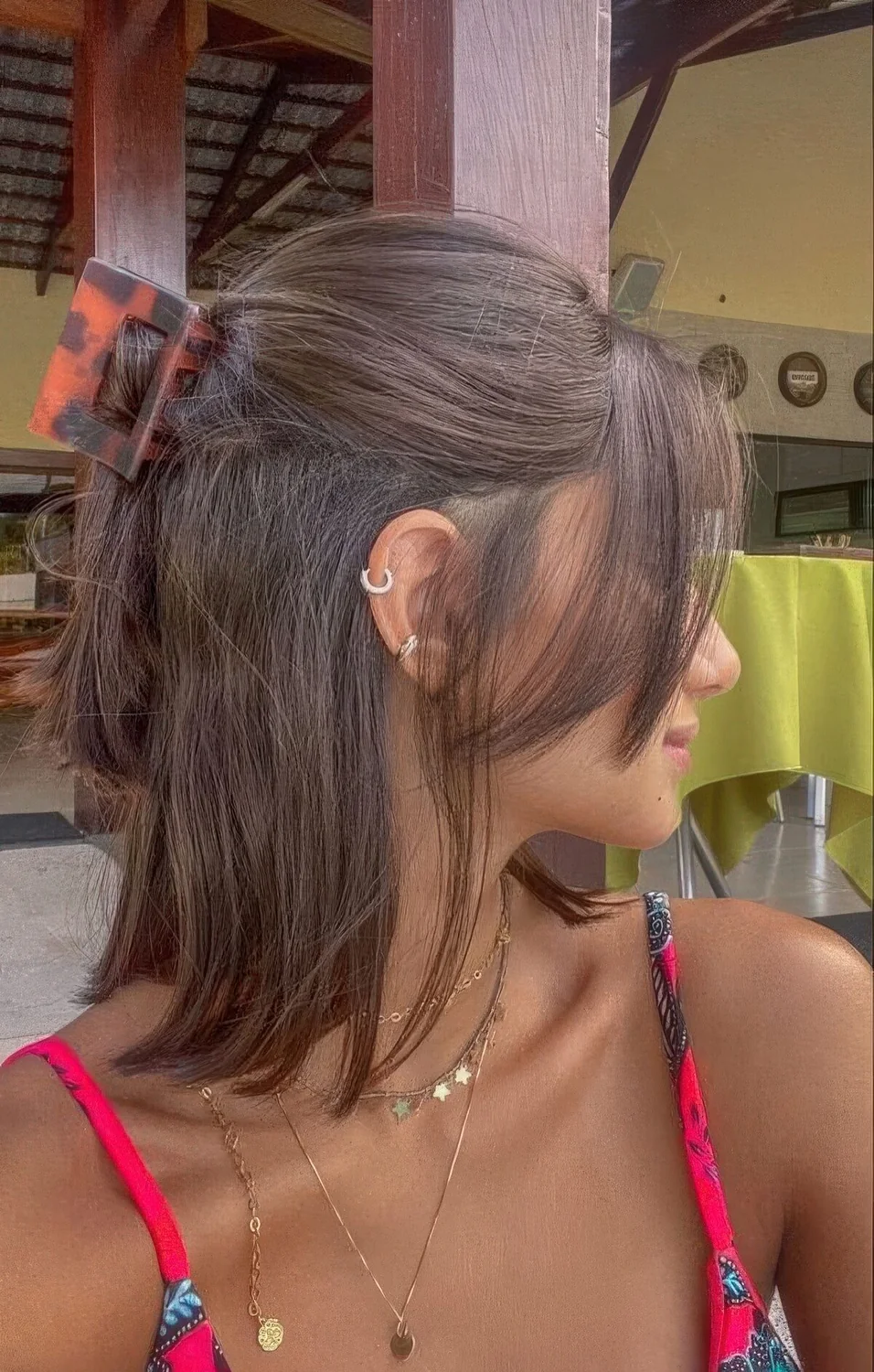 Photo showing half updo with a clip, with the hairstyle clearly visible.