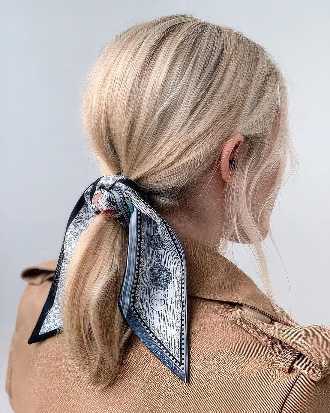 Photo showing low ponytail, with the hairstyle clearly visible.