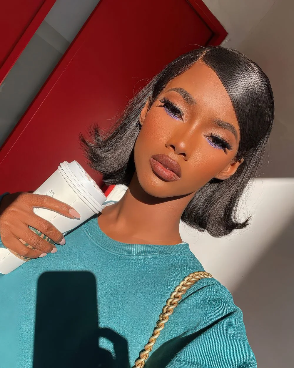 Photo showing shiny flipped bob side part, with the hairstyle clearly visible.
