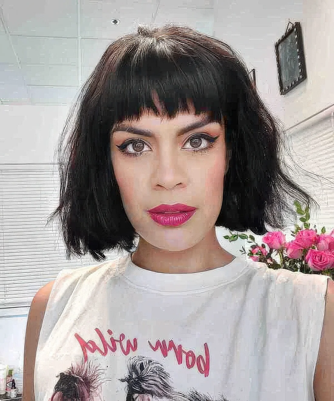 Chin-length French bob with a fringe and a lot of texture.