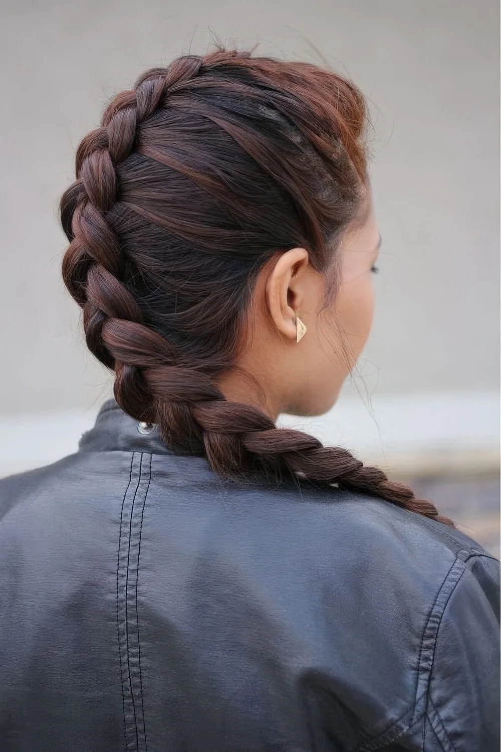 Photo showing french braid going down, with the hairstyle clearly visible.