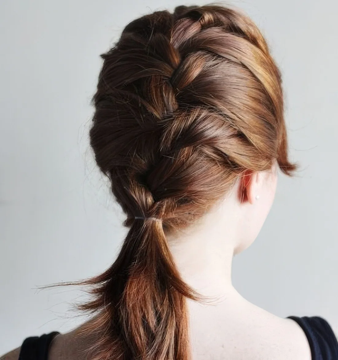 Photo showing low ponytail hairstyle, with the hairstyle clearly visible.