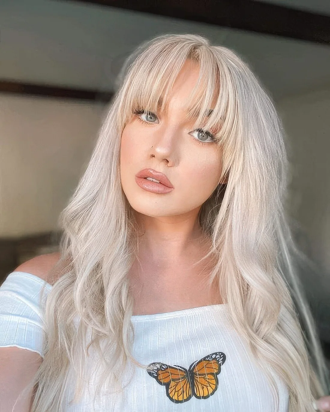 Photo showing icy blonde hairstyle, with the hairstyle clearly visible.