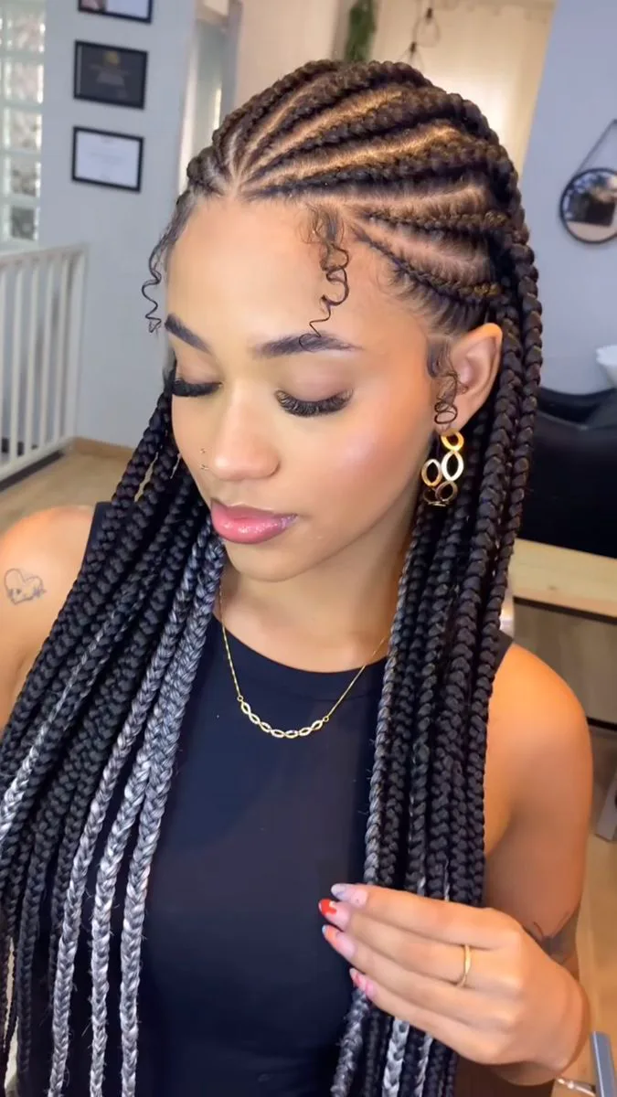chest braids black knotless shown as a fulani braids idea, featuring chest outline, shown in black woman cornrows with curly baby hairs for fulani braids