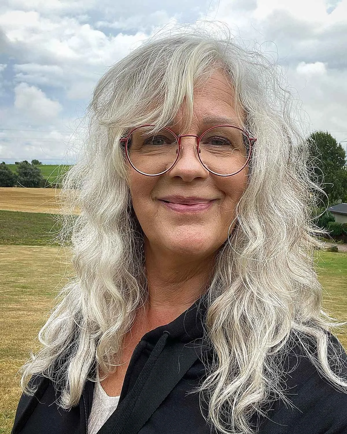 chest wavy gray layers shown as a gray blending for older women idea
