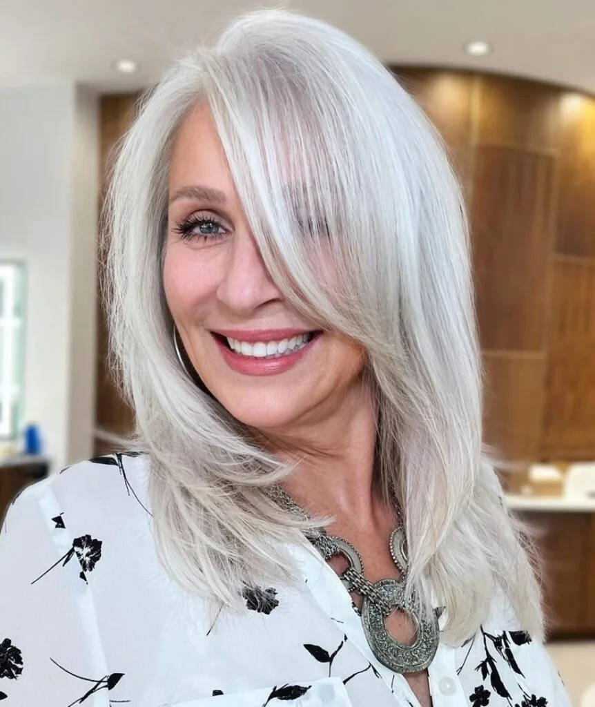 chest straight gray layers with side swept fringe shown as a gray blending for older women idea, featuring side part