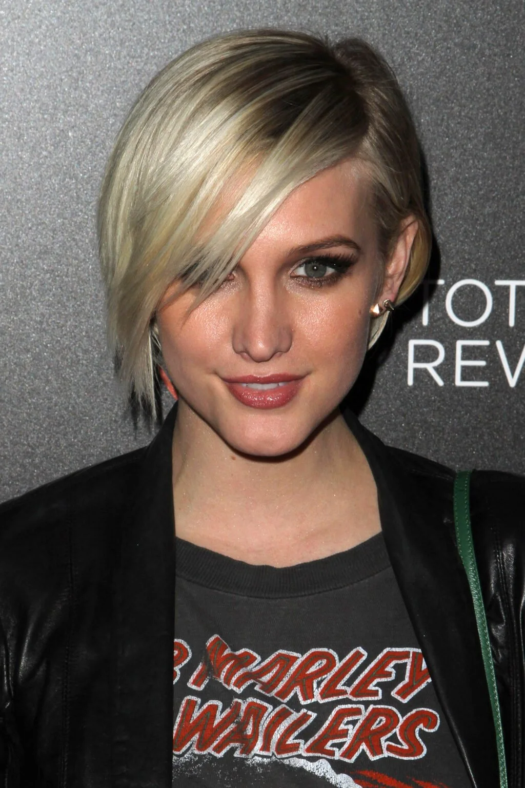 ear straight chestnut pixie with side swept fringe shown as a haircuts for thin fine hair idea