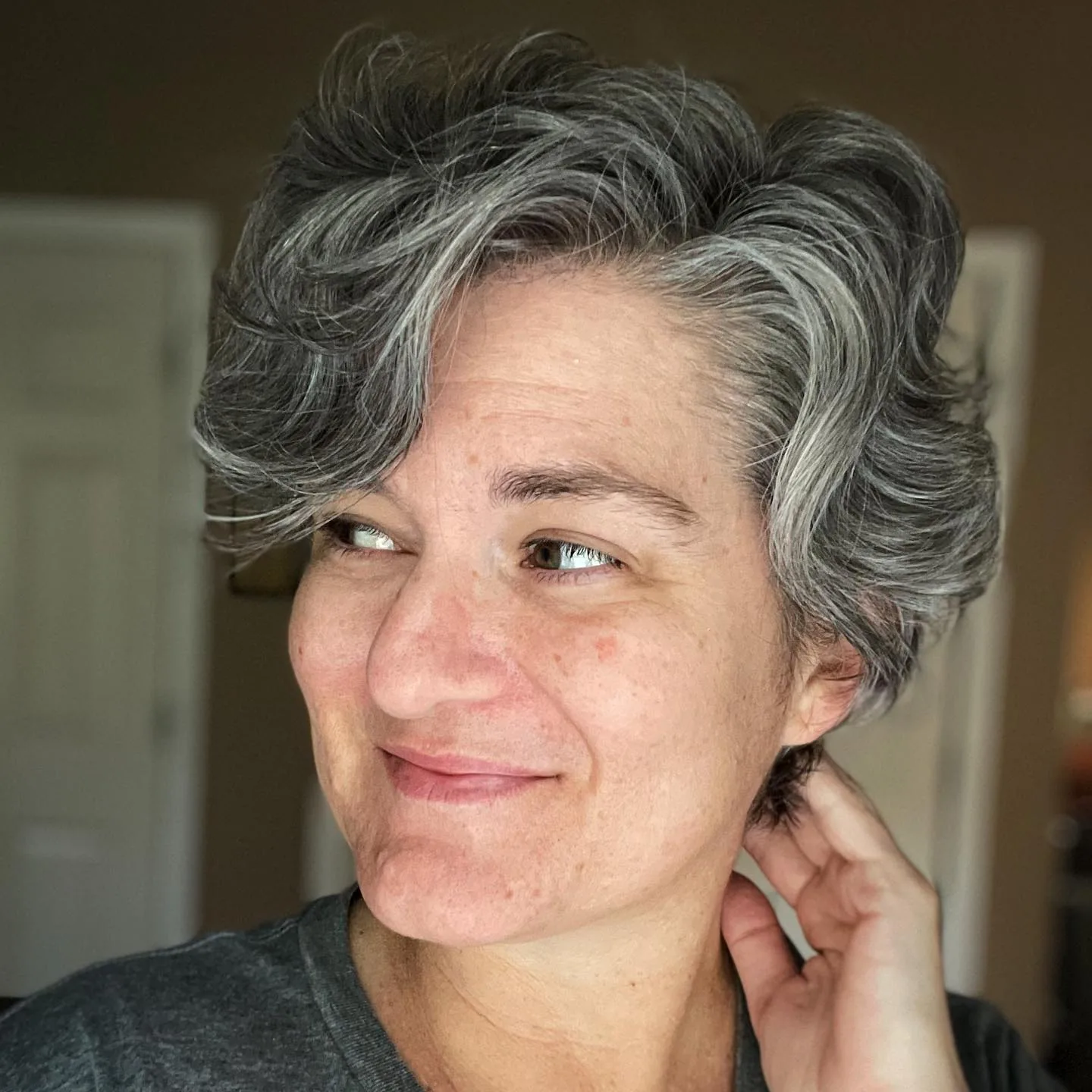 pixie wavy gray pixie shown as a haircuts for women over 50 idea
