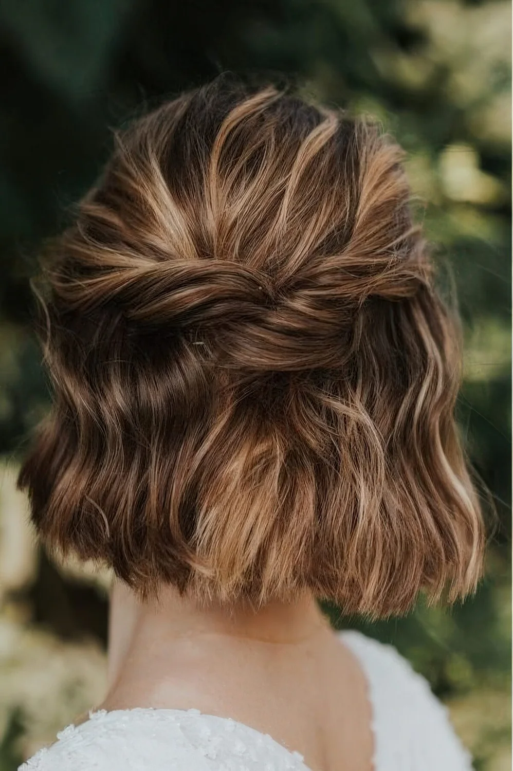 Simple half updo with twists and some waves down.