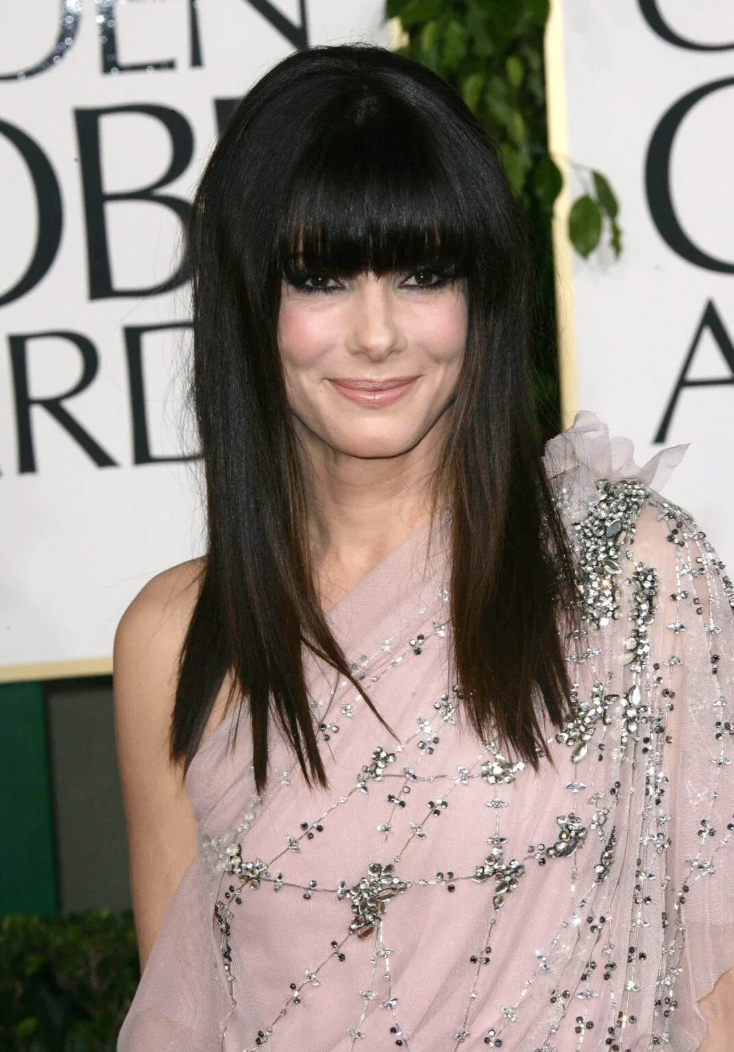 chest straight black bangs with blunt fringe shown as a hairstyles for going out idea