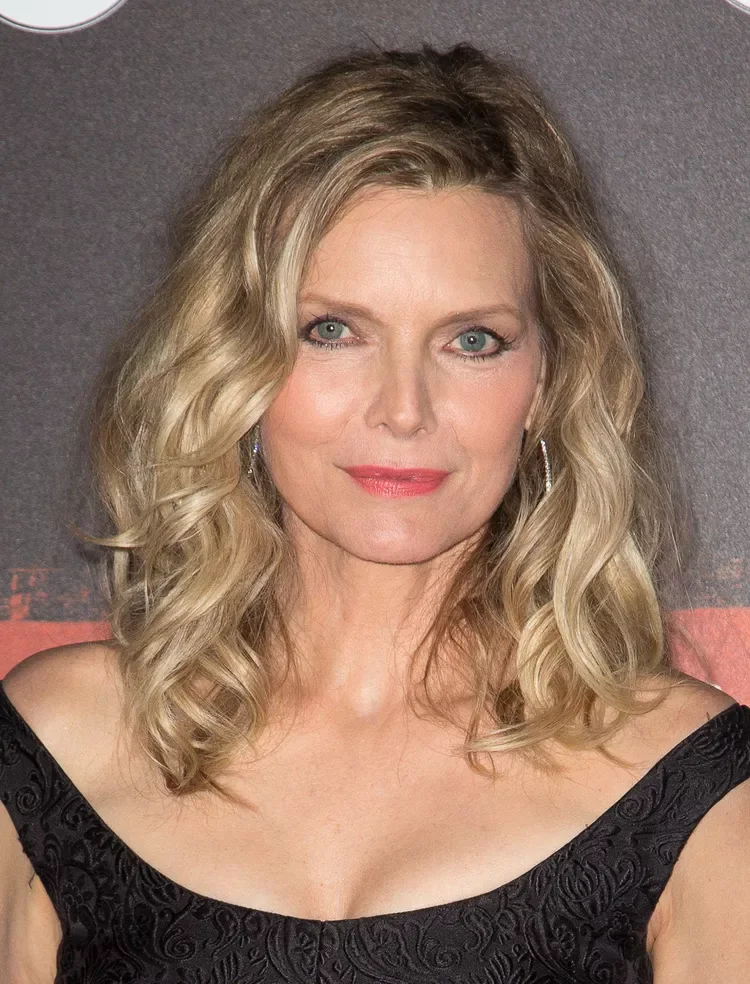 shoulder wavy chestnut lob shown as a hairstyles for women over 60 with thin hair idea, featuring light layering