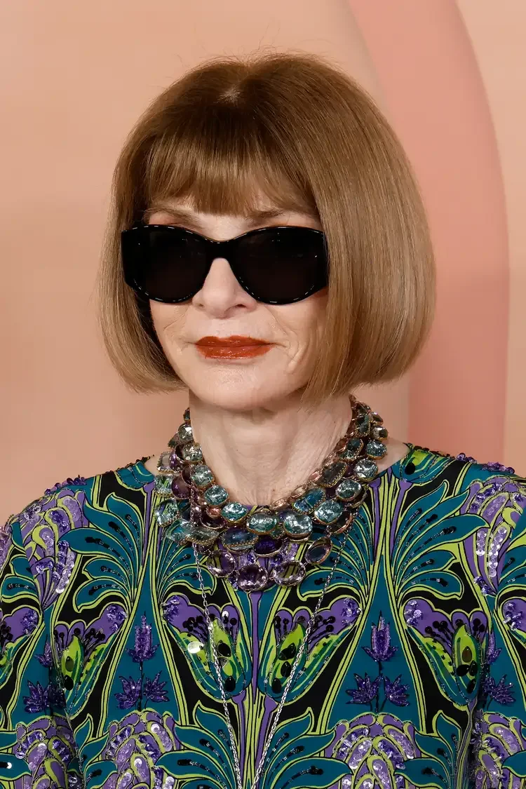 chin straight chestnut bob with blunt fringe shown as a hairstyles with bangs for older women idea