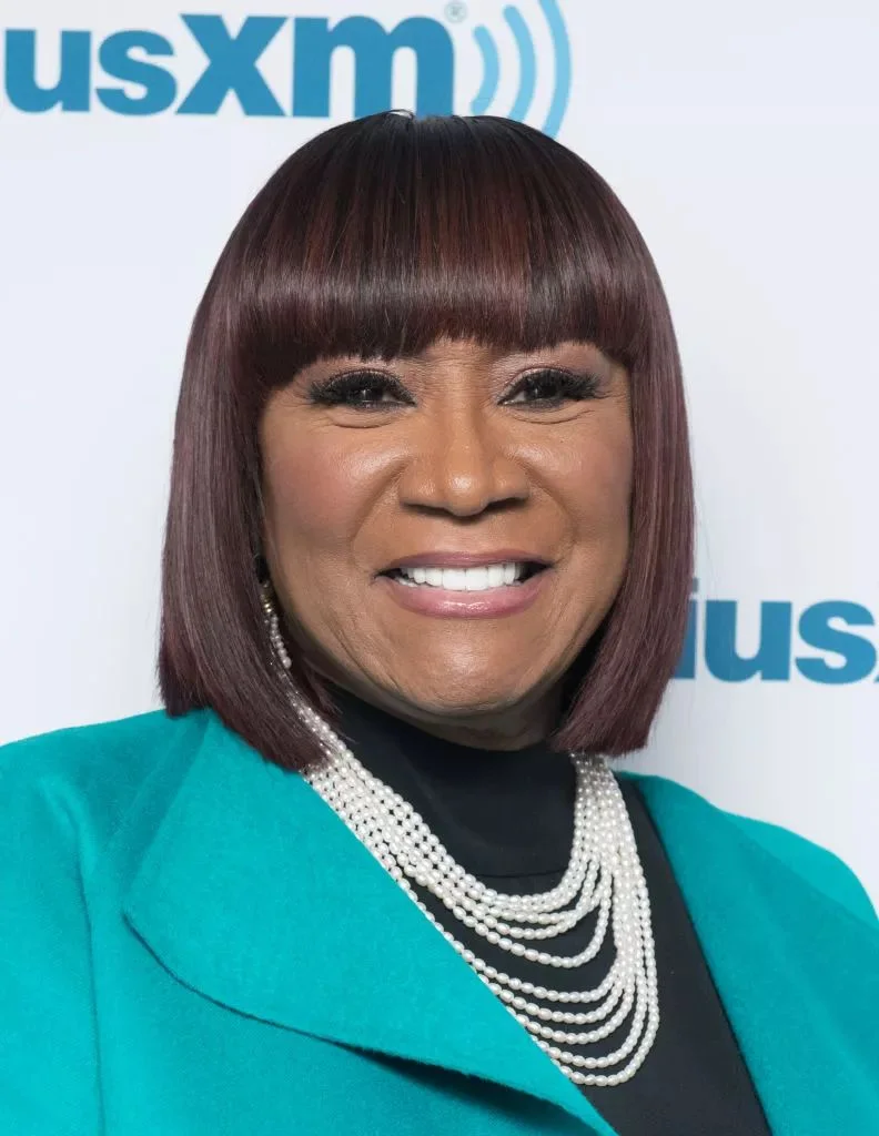 chin straight chestnut bob with blunt fringe shown as a hairstyles with bangs for older women idea, featuring chin outline