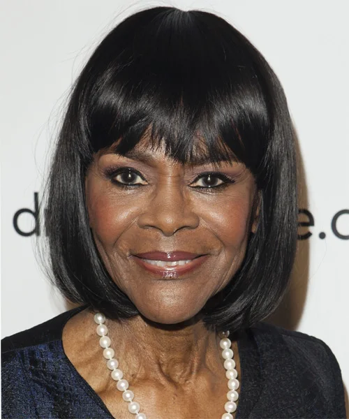 chin straight black bob with blunt fringe shown as a hairstyles with bangs for older women idea