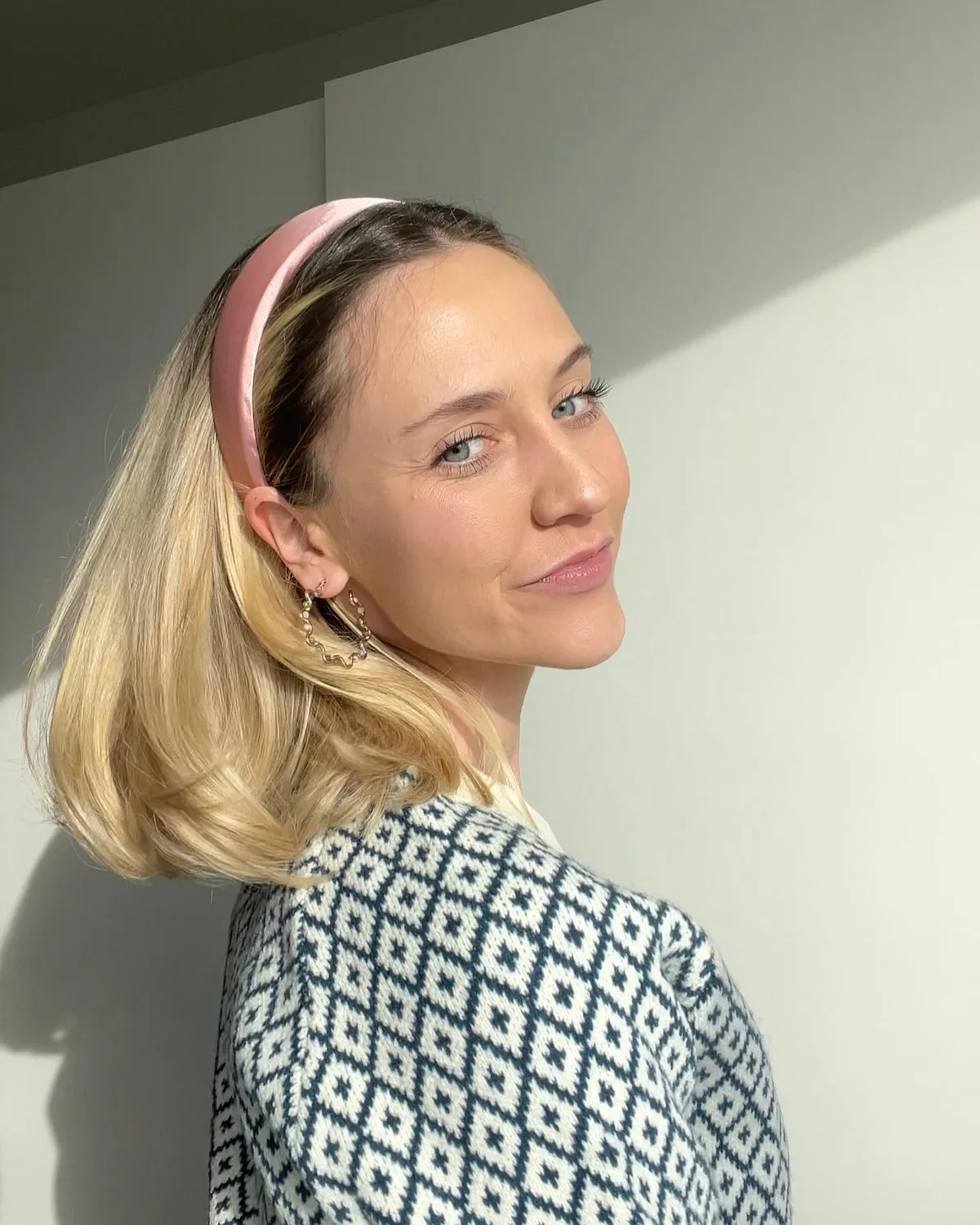 chin straight blonde bob shown as a headband hairstyles idea