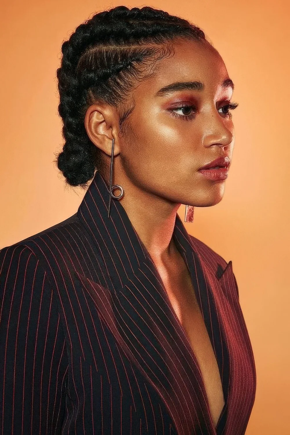 Braided low bun plus a braided top look very chic and cool and such a hairstyle.