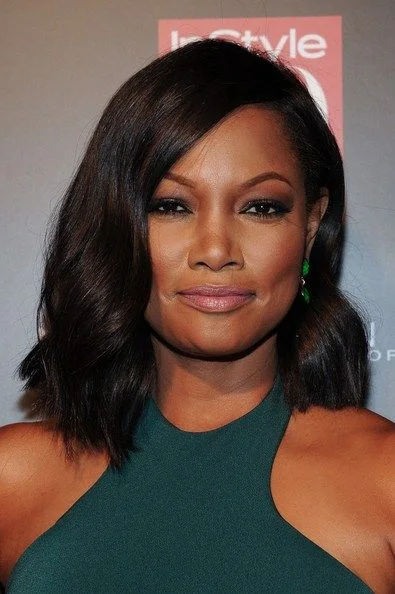 shoulder straight black bob shown as a hollywood waves idea