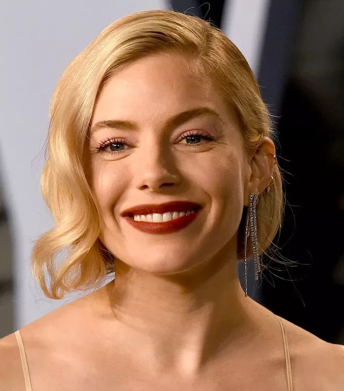 shoulder wavy golden layers shown as a hollywood waves idea