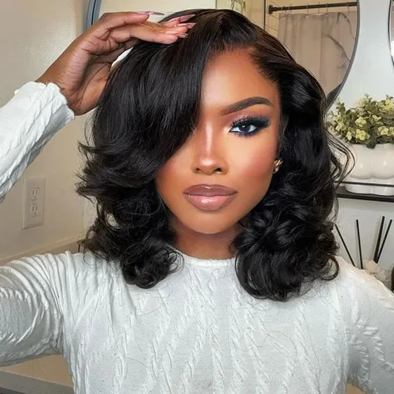shoulder wavy black layers shown as a hollywood waves idea, featuring center part