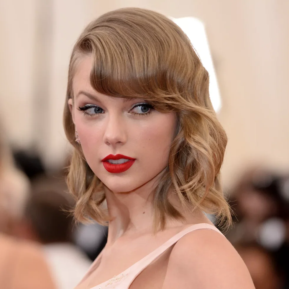 shoulder wavy honey shag with curtain fringe shown as a hollywood waves idea