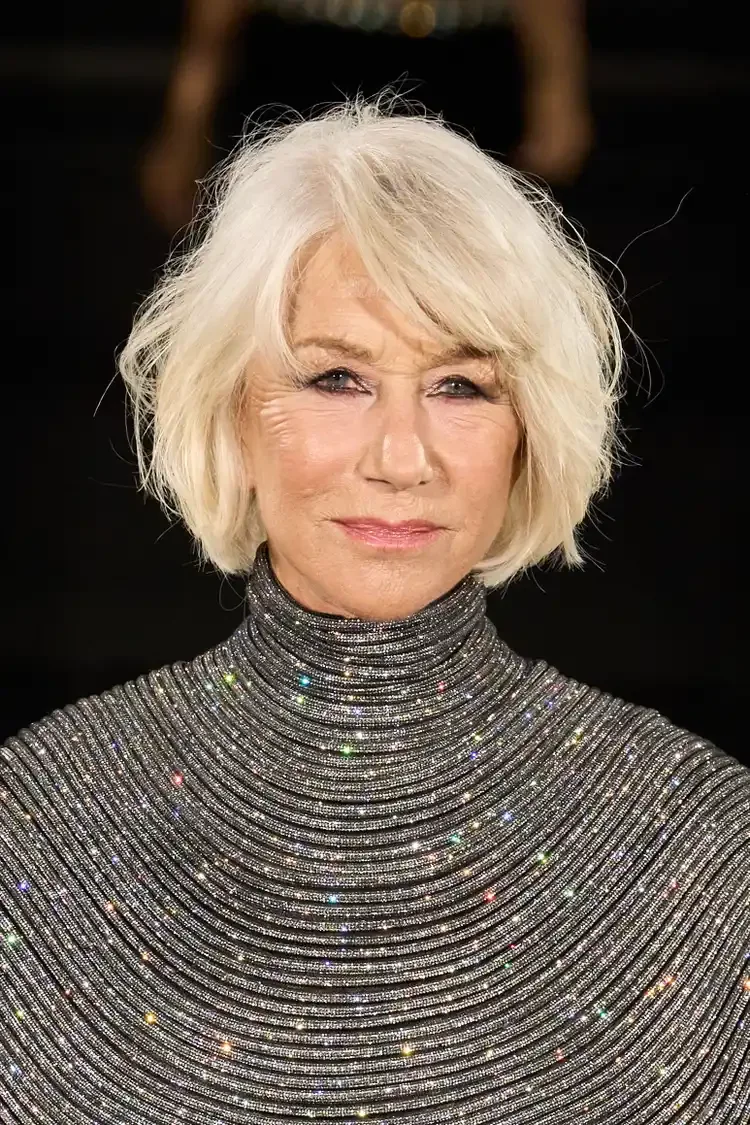 ear straight honey pixie with side swept fringe shown as a layered bob haircuts for women over 60 idea
