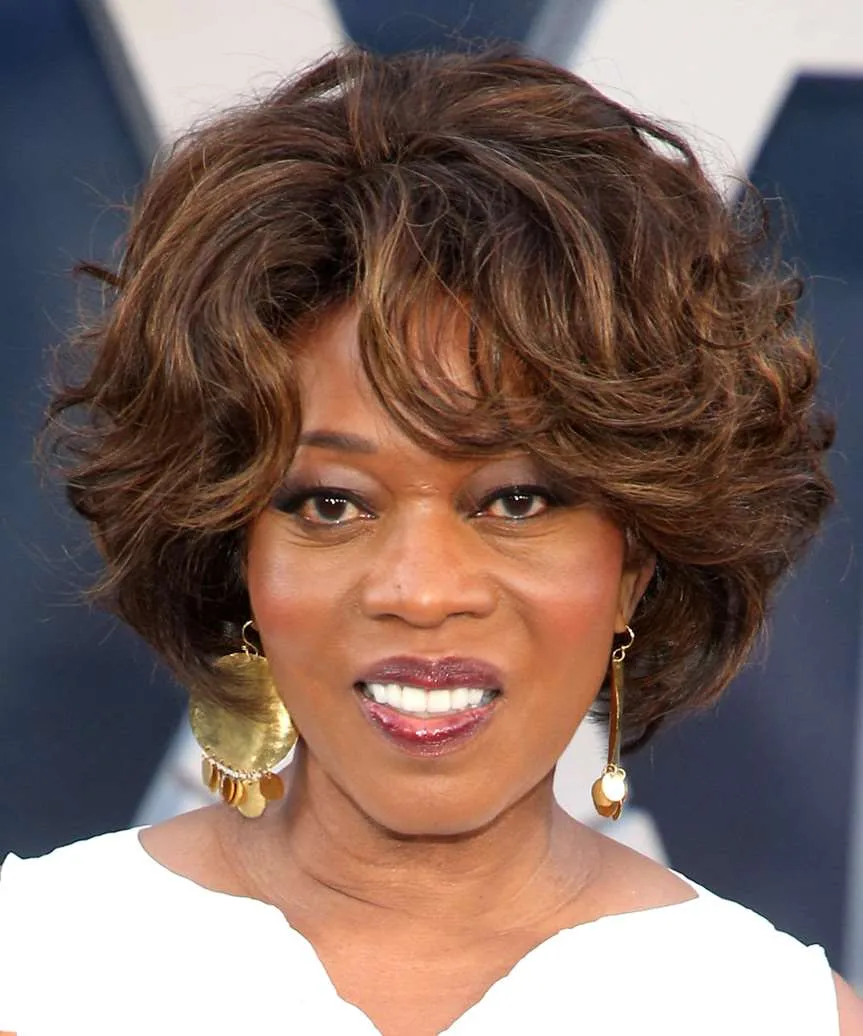 jaw curly chestnut bob with curly fringe fringe shown as a layered bob hairstyles for older women idea