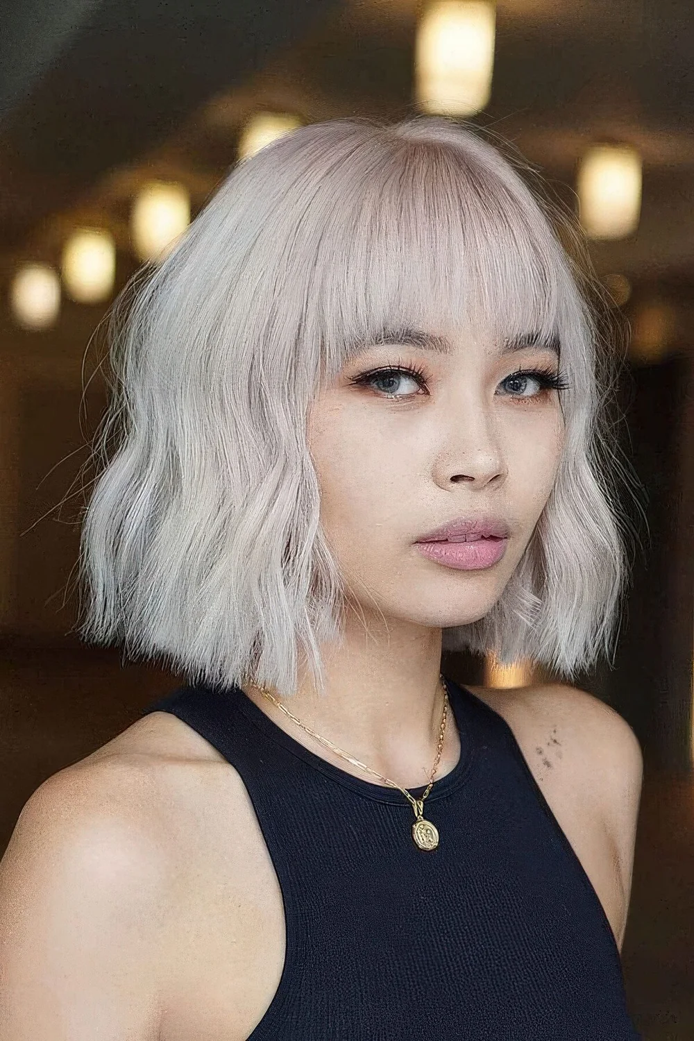 Photo showing icy blonde hairstyle, with the hairstyle clearly visible.