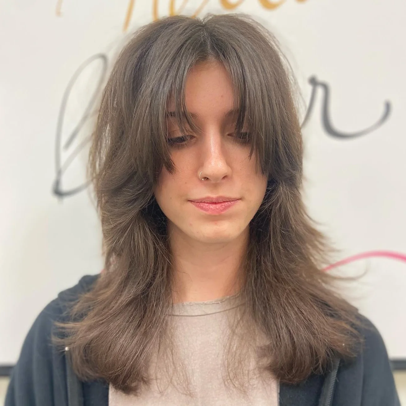 shoulder wavy chestnut shag with curtain fringe shown as a layered hair with bangs idea