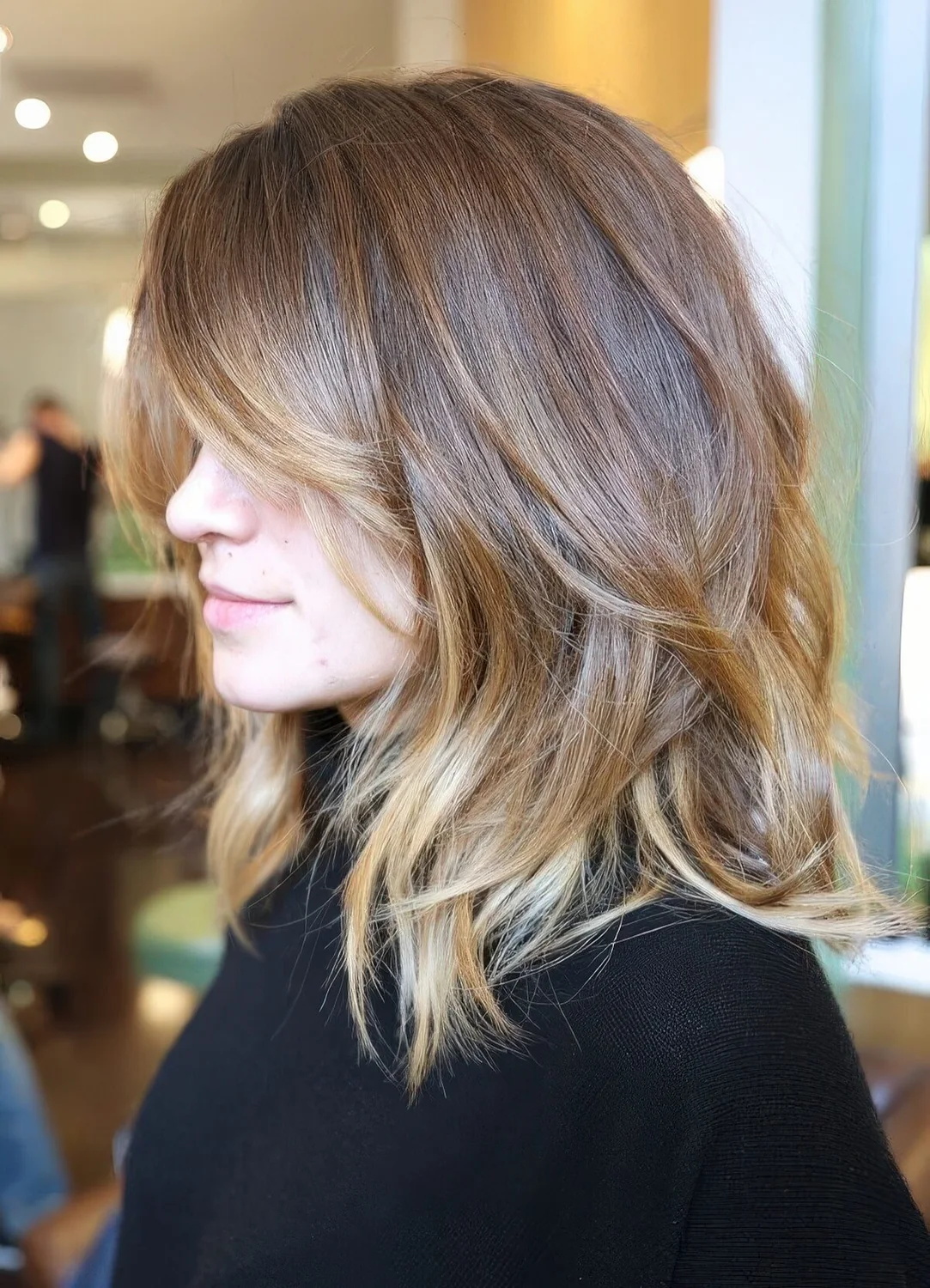Light brunette long bob with blong balayage and money peice, curtain bans and layers.