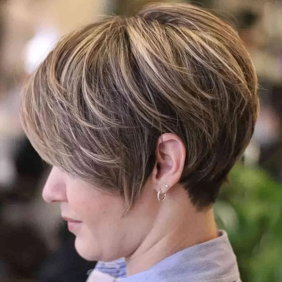 Layered pixie with bronde highlights, which add volume and dimension, and a wispy fringe may be a perfect finish.