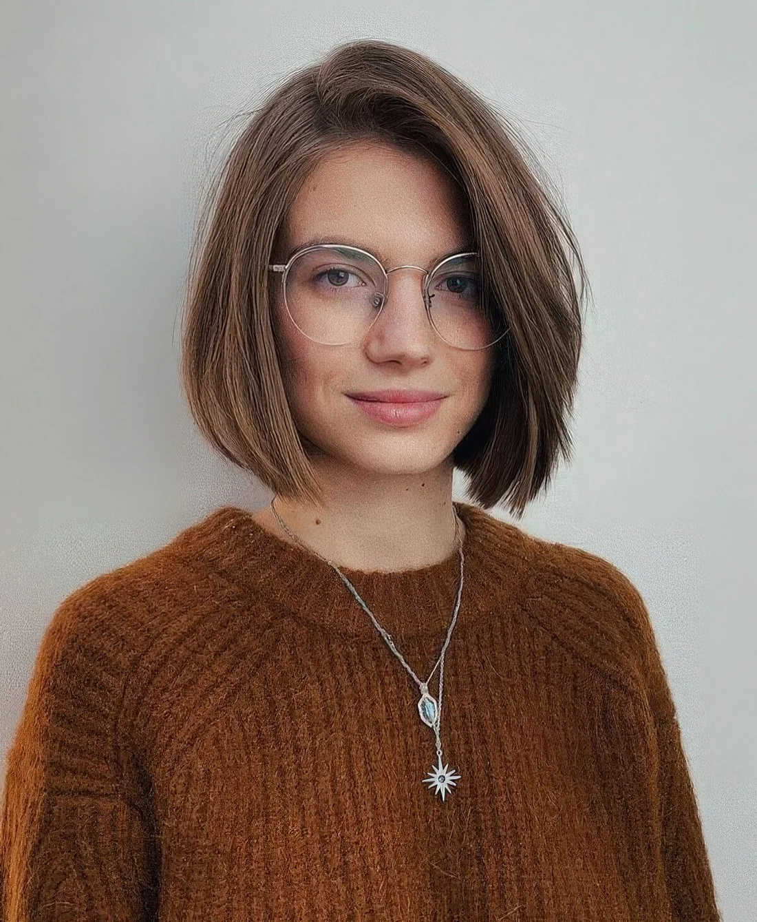 Light brunette volumetric midi bob with some texture si a very cool and catchy idea.